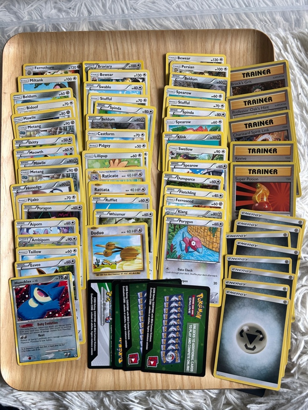 65 Grey/silver Lot of Pokémon Playing and Trading Cards, trainers, energy, onlin
